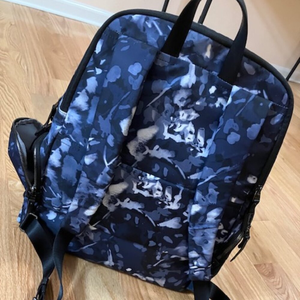 Women's blue Tumi backpack